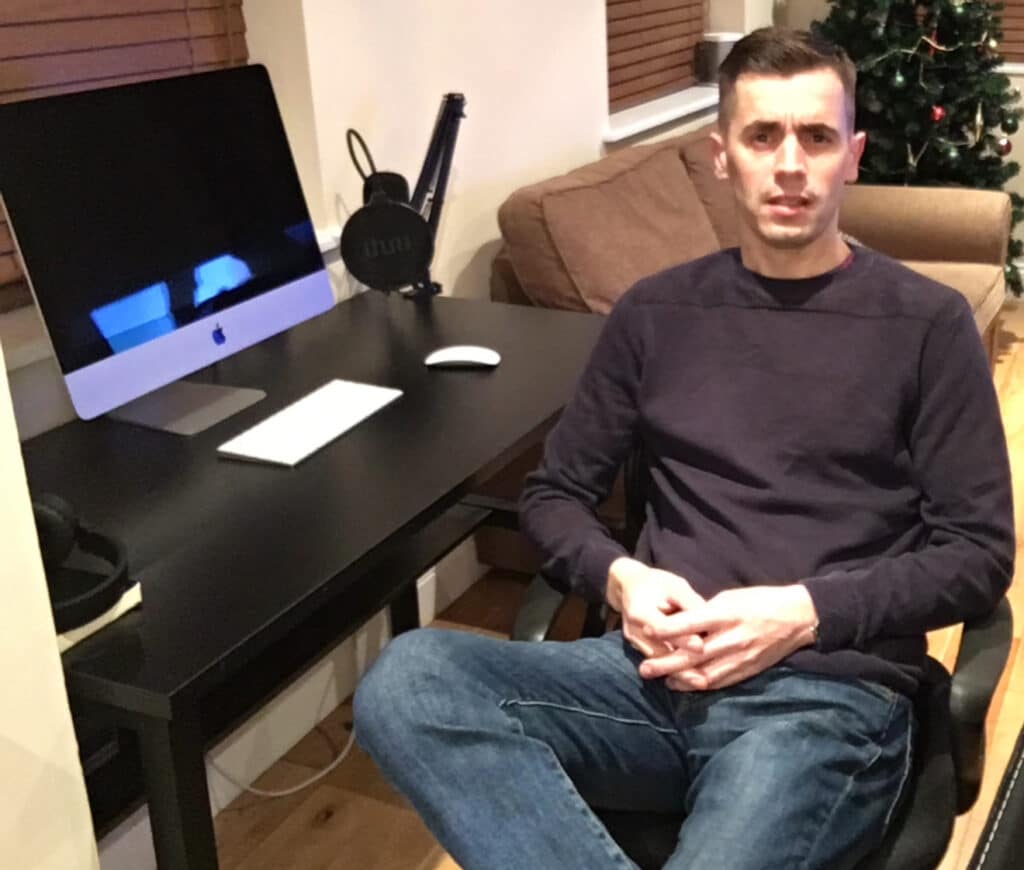 Nelson Fernandes, Founder of Best of Motivation, seated in home office.