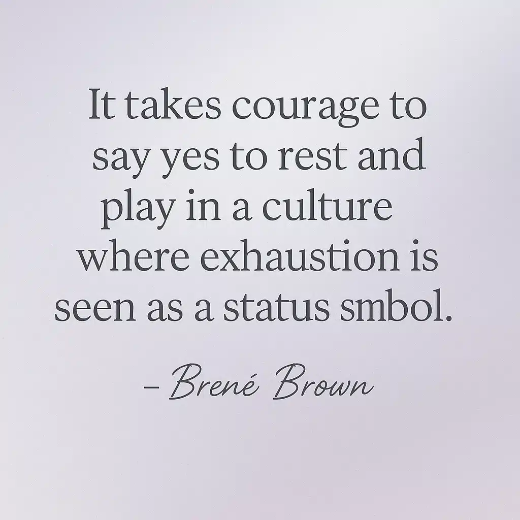 Instagram-style quote card with a soft lavender-to-gray gradient background. Centered serif text reads: “It takes courage to say yes to rest and play in a culture where exhaustion is seen as a status symbol.” Below the quote, the author’s name “– Brené Brown” appears in elegant script. A small footer reads bestofmotivation.com.
